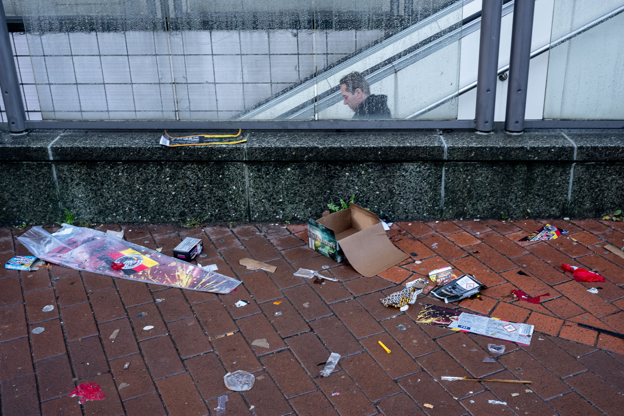 Trash next to the subway entrance.